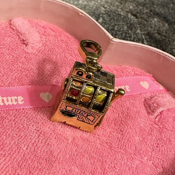 Juicy Couture Jewelry - rare vintage slots juicy charm!